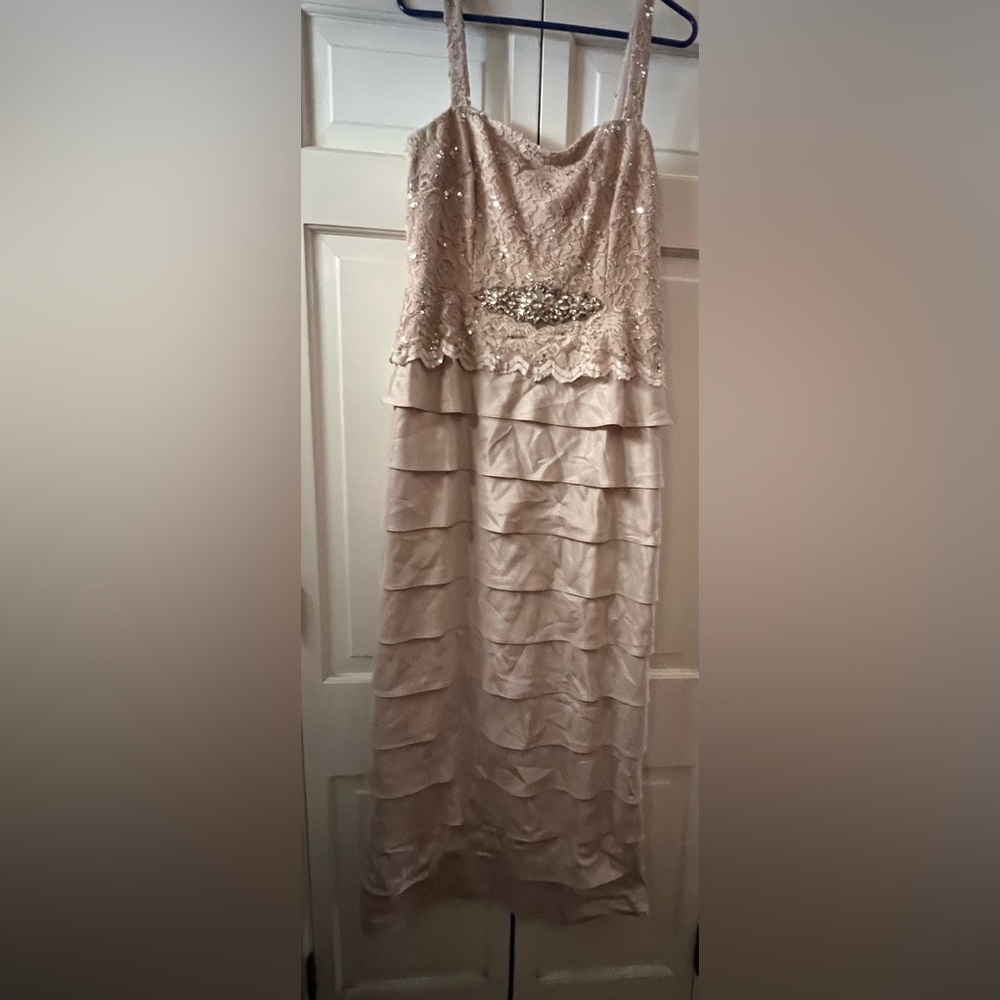 Elegant Cream Sleeveless Dress with Embellishments